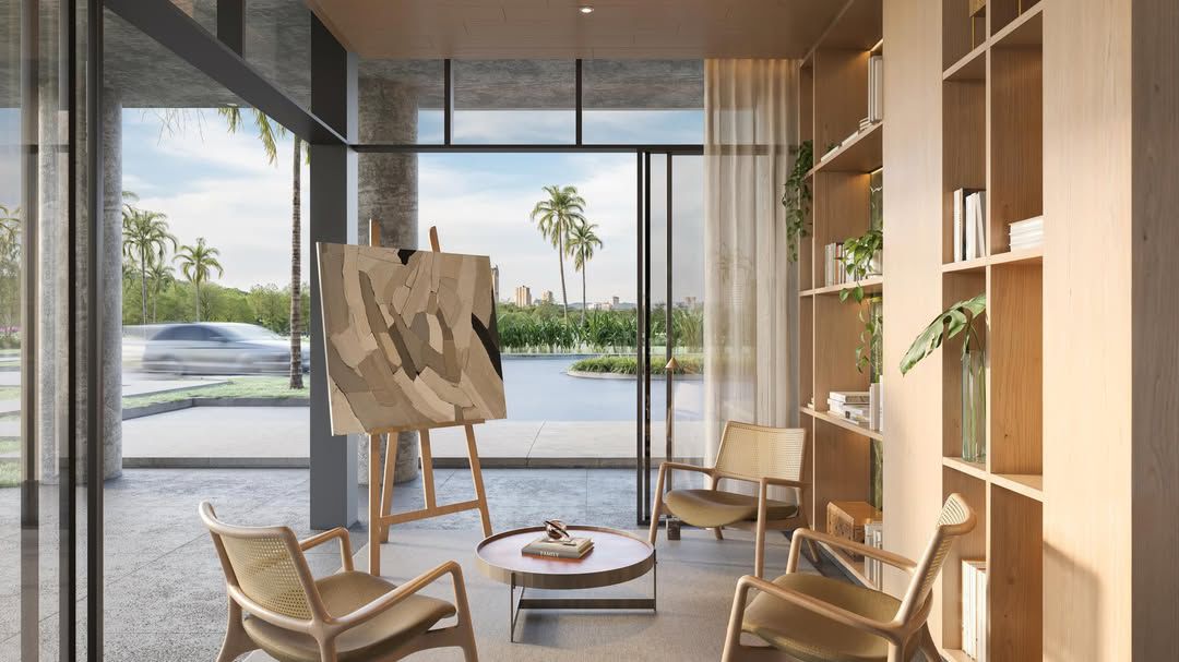 Lounge com arte e vista para o lago no Icon Sudoeste